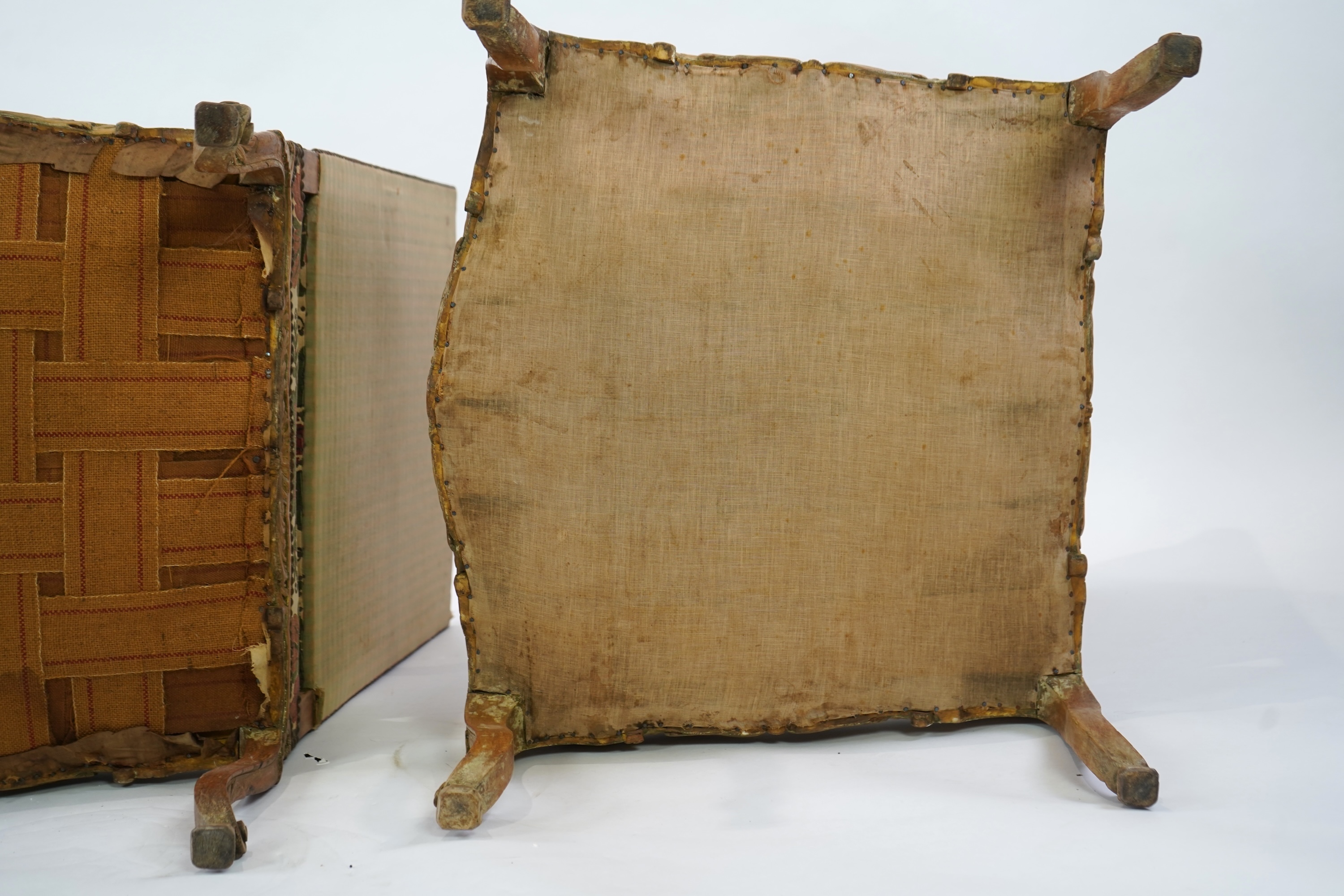 A pair of 19th century Louis XV style carved walnut grand fauteuil